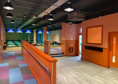 Bowling lane access and customer circulation area at Bar10