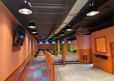 Bowling lane entrance and customer circulation area at Bar10 Irvine