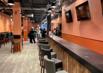 Bespoke timber-effect bar installation at Bar10 Irvine