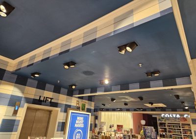 Interior overview of the Bath & Body Works store following ceiling strip-back and commercial redecoration by Central Shop Maintenance at Meadowhall Sheffield.