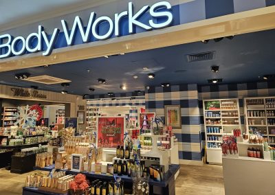 Refurbished Bath & Body Works retail entrance and shop interior after commercial ceiling decoration works at Meadowhall Sheffield.