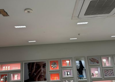 Close-up of new LED ceiling panels and CCTV camera installed at Pandora Nuneaton