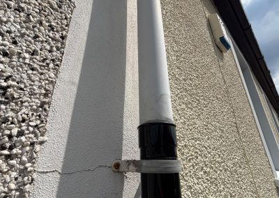 New guttering and downpipe close-up at vet surgery Blackwood
