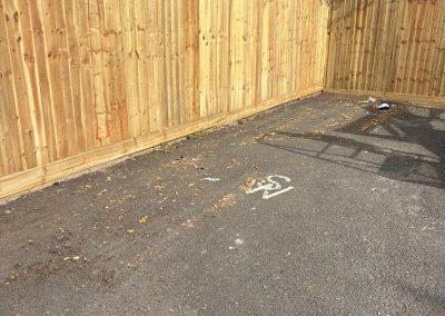New timber boundary fence at corner of vet surgery car park
