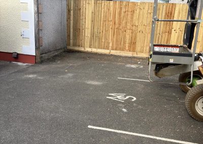New fence and cherry picker access platform at rear of vet surgery