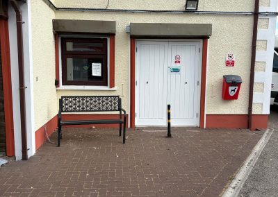 Rear courtyard entrance with bench at Summerwood Vets Blackwood