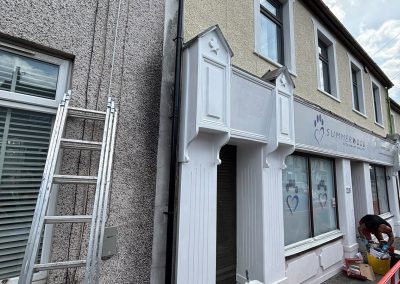 Repainting shopfront entrance canopy at vet surgery in Blackwood